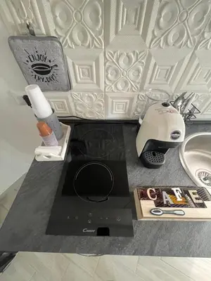 a bathroom counter with a sink and a counter top with a counter top at RC SUITE TERMINI IMERESE in Termini Imerese