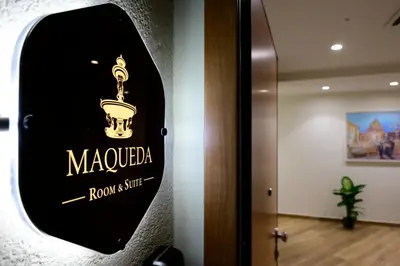 a sign on the door of a hotel room at B&B Maqueda - Room & Suite in Palermo