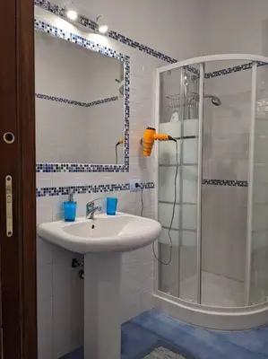 a bathroom with a sink and a shower at CASA 3T a Isola a 15 min dal centro di Palermo in Isola delle Femmine