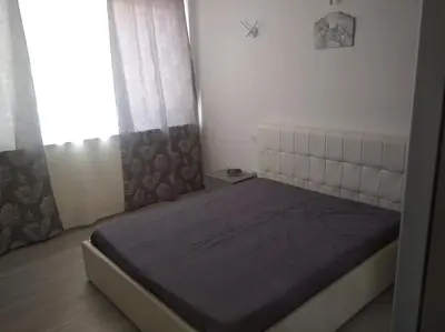 a bedroom with a bed in a room with a window at Casa vacanze Venere in Balestrate