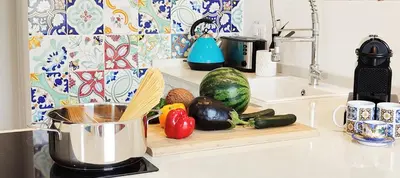 a kitchen counter with vegetables on a cutting board at Panoramic Villa 200m from the Sea with Heated Pool & Whirpool in Terrasini