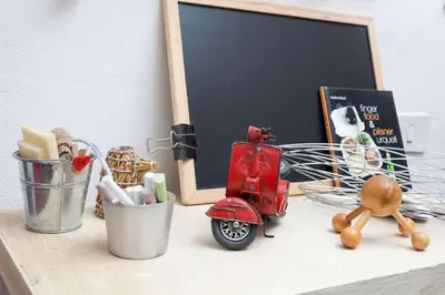 a desk with a toy scooter on top of it at Casa Design con terrazzo in centro storico a Palermo in Palermo