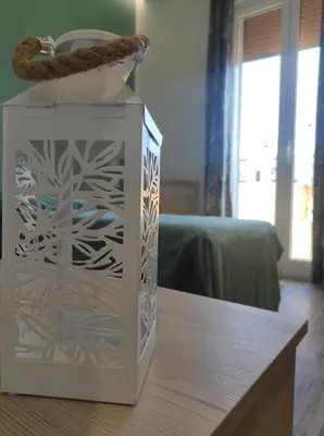 a white box sitting on a wooden table at Green Suite Palermo in Palermo