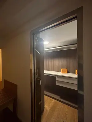 a room with a closet with a glass door at Prince Suite Palermo in Palermo
