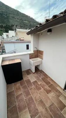 a bathroom with a sink on top of a building at Zohra in Castellammare del Golfo