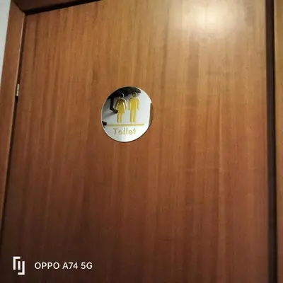 a door with a hotel sign on it at Vucciria's house centro storico in Palermo