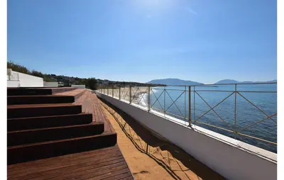 a group of stairs next to a body of water at Nice Home In Balestrate in Balestrate