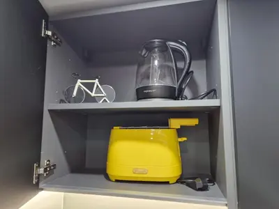 a yellow blender on a shelf in a refrigerator at LA CASA DI TIAGO in Palermo
