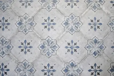 a close up of a blue and white tiled floor at iFlat Dimora del Cassaro in Palermo